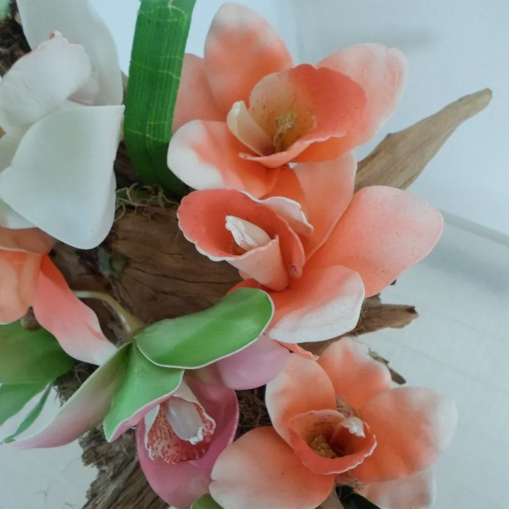 Fabric Orchids on a Tree Trunk Floral Arrangement